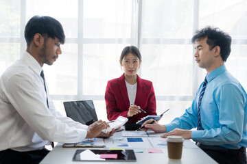 A group of successful young business people present financial reports at meetings and brainstorm ideas to analyze and plan business strategies.