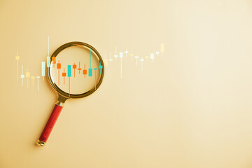 power of analysis in hands oftrader, as they usemagnifier glass to study technical graph of stock market chart, strategizing for optimal investment opportunities. Technical price graph and indicator