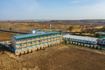 building of the sanatorium saryagash city of shymkent. hotel for patients to relax after mineral water treatments. rooms for people to relax after treatment in a sanatorium - obrazy, fototapety, plakaty