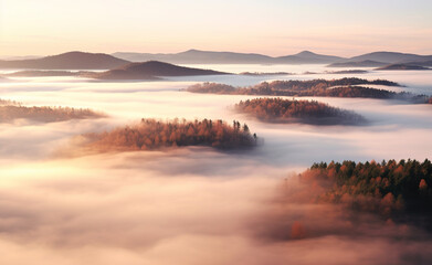 misty morning with sunrise in the mountains