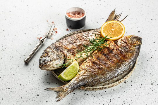 dorado. Whole grilled fish. organic healthy products. Detox and clean diet concept. place for text, top view