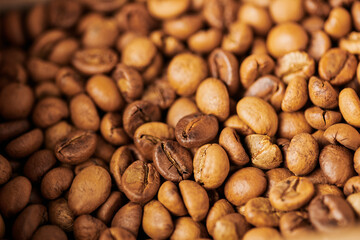 aromatic coffee beans in wooden box, light roast, caffeine and energy, coffee background, arabica