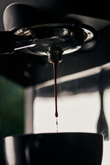 coffee extraction, drops, hot beverage, espresso dripping into cup,  professional coffee machine