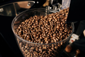 selected and medium roasted coffee beans in coffee shop, aromatic and freshness, espresso brew