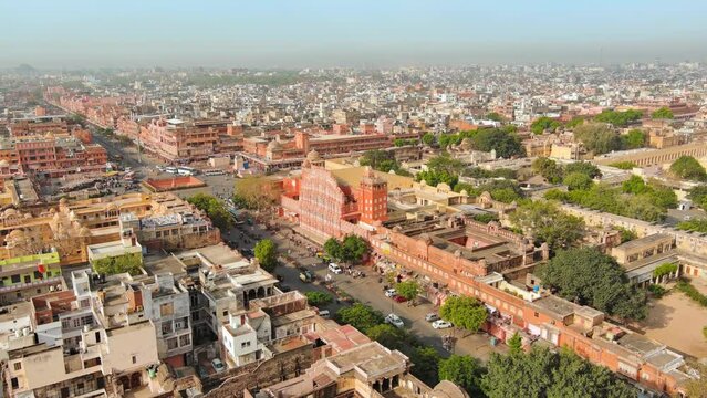 Jaipur, India: Aerial view of capital and largest city of Rajasthan, famous palace The Hawa Mahal, built from red and pink sandstone - landscape panorama of South Asia from above