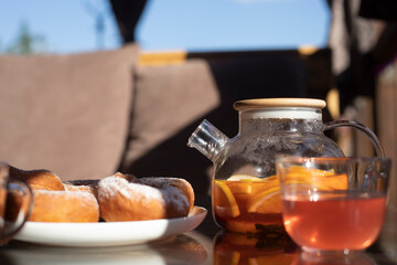 Cup of fruit tea on table. Tea in morning. Delicious food.