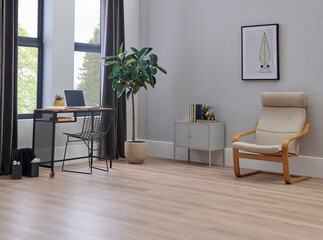 Modern grey wall background room style with chair furniture plant and working table.