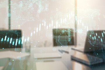 Double exposure of abstract creative financial diagram with world map and modern desk with computer on background, banking and accounting concept