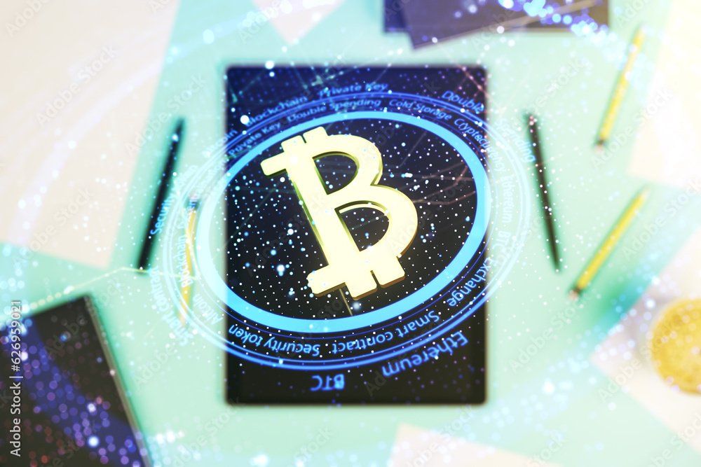 Poster Creative Bitcoin concept and modern digital tablet on desktop on background, top view. Double exposure