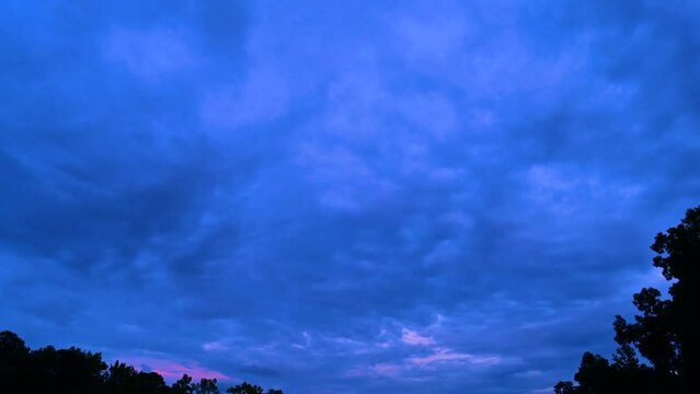 Early summer sky from dusk through dark, time lapse