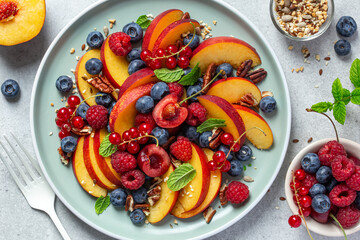sweet and tasty fresh healthy fruits and berries salad