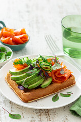 waffles with smoked salmon, avocado and cucumber