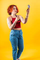LGBT non-binary woman. Prideful and Colorful: Non-Binary Redhead with Diverse Tattoos