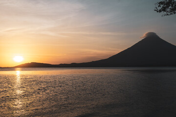 Naklejka na ściany i meble Mesmerising Sunset Scenery: Majestic Lake Nicaragua with Volcano Concepción