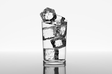Glass of iced water on reflective surface on white background. Illustration as the concept of cold drinks