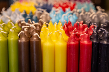 Vibrant unlit candles with a shallow depth of field