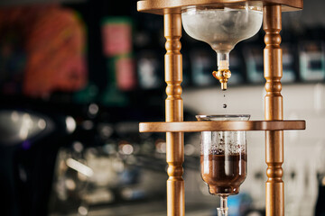 alternative way of espresso brewing, cold water dripping on ground coffee in cold brew coffee maker