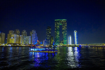 Fototapeta premium Dubai Marina in Dubai, UAE. View of the skyscrapers and the canal. view at night