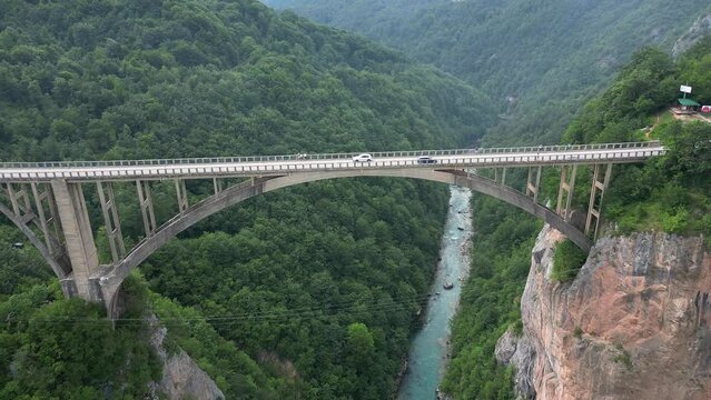 Djurdjevic is arched bridge across the Tara River. Montenegro. Aerial view.