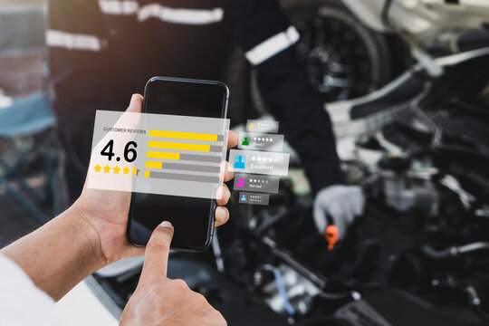 Men rate service experiences on online applications.Customer reviews and assessments of the service after mechanic repair and maintenance car.