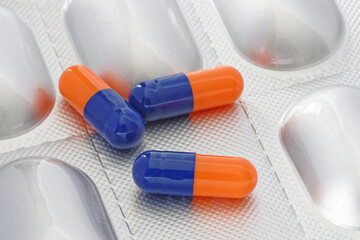 Close up of a Group of Colorful Pills or Capsules. Statins. Antibiotics.