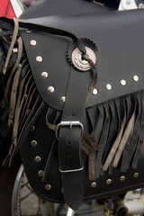 detail of motorcycle leather saddlebag