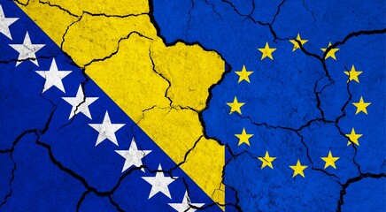 Flags of Bosnia and European Union on cracked surface - politics, relationship concept
