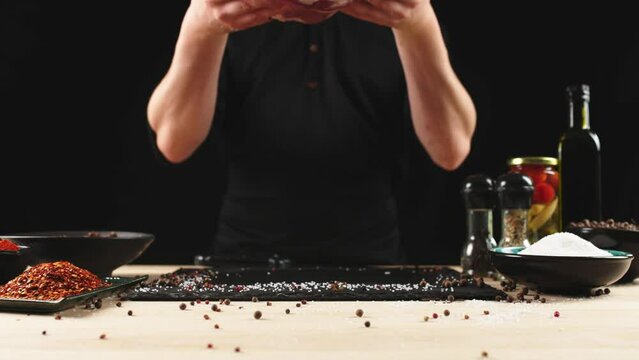 Close-up of falling tasty beef steak in kitchen, super slow motion, camera movement, filmed on high speed cinematic camera