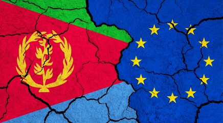 Flags of Eritrea and European Union on cracked surface - politics, relationship concept