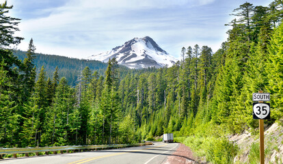 mountain road , Mount Hood is  potentially active stratovolcano near portland city, oregon, usa, Glaciers and snowfields cover most of the mountain, Mount Hood is within the Mount Hood national forest
