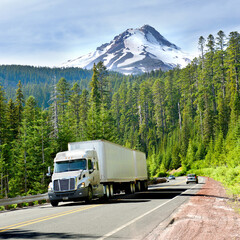 truck on highway,  Mount Hood is a potentially active stratovolcano near portland , oregon, usa, Glaciers and snowfields cover most of the mountain, Mount Hood is within the Mount Hood National Forest
