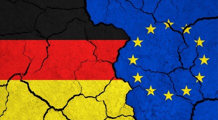 Flags of Germany and European Union on cracked surface - politics, relationship concept