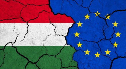 Flags of Hungary and European Union on cracked surface - politics, relationship concept