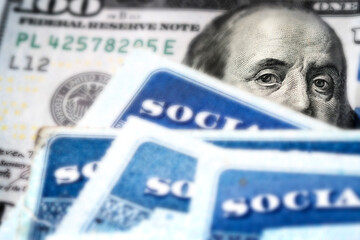 Social Security Cards with US One Hundred Dollar Bill $100