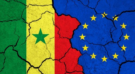 Flags of Senegal and European Union on cracked surface - politics, relationship concept