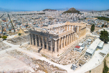 Aerial drone image of the Acropolis with the Parthenon in Athens, Greece. No people. Construction and restoration works underway. Clear summer day. High quality photo