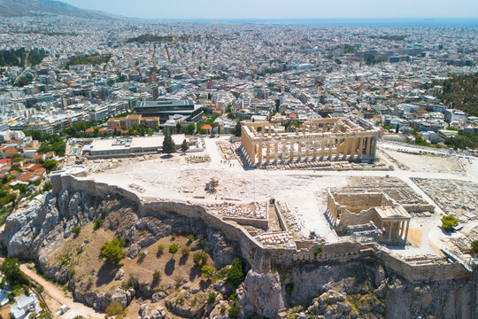 Aerial drone image of the Acropolis with the Parthenon in Athens, Greece. No people. Construction and restoration works underway. Clear summer day. High quality photo