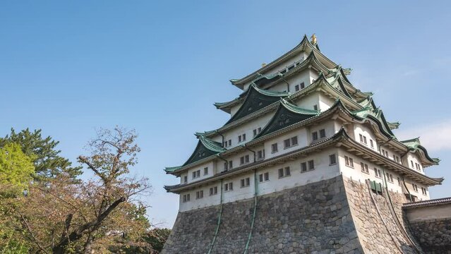 Nagoya Aichi Japan time lapse 4K, city skyline timelapse at Nagoya Castle in autumn season