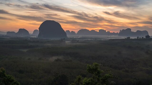 Mountain view sunrise time lapse at Din Deang Doi viewpoint with tropical forest, Krabi Thailand nature landscape timelapse