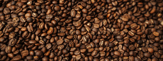 Roasted Coffee Beans Background Texture, Cafe and Refreshing Beverage for Cover or Wallpaper.