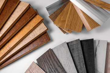 flooring material and skirting samples on white background