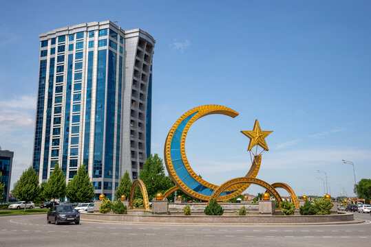 ARGUN, RUSSIA - JUNE 14, 2023: The composition of a crescent moon with a star on the city square. Chechen Republic