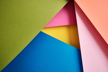 Abstract texture of colored paper. Geometric shapes and lines in bright colors. Place for text. Multicolor abstract flat lay. Back to school concept. Copy space, top view