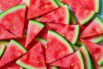 Macro sliced watermelon,Red watermelon triangular piece on white blackground