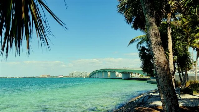 Causeway and waterfront cityscape of Sarasota in sunny day