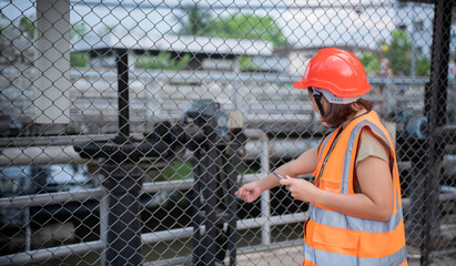 An advanced electrical engineer inspects the electrical system of the waterworks,Maintenance...