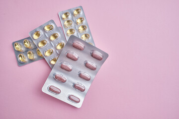 Close-up of a pill on the background. Taking vitamins or medications. The concept of healthcare, medicine, pharmacies, disease prevention