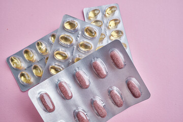Close-up of a pill on the background. Taking vitamins or medications. The concept of healthcare, medicine, pharmacies, disease prevention
