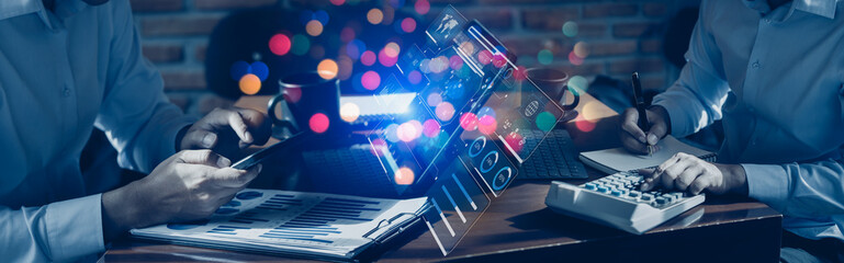 Technology and financial advisory services concert. Business teamwork and working on digital laptop computer with advisor showing plan of investment to clients at table office. Digital marketing.