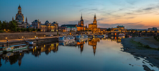  Dresden city skyline at Elbe river and Augustus Bridge at sunset , Dresden, Saxony, Germany....